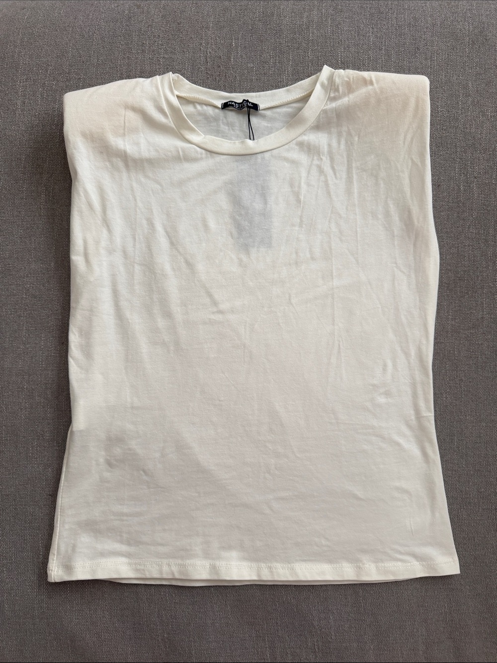 NWT nasty gal sleeveless white shirt with shoulder pads